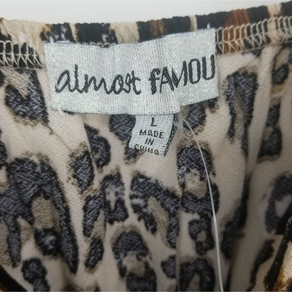 Almost Famous Cut-Out Bow Tie Front Leopard Print Romper Size Large NEW - Picture 7 of 10